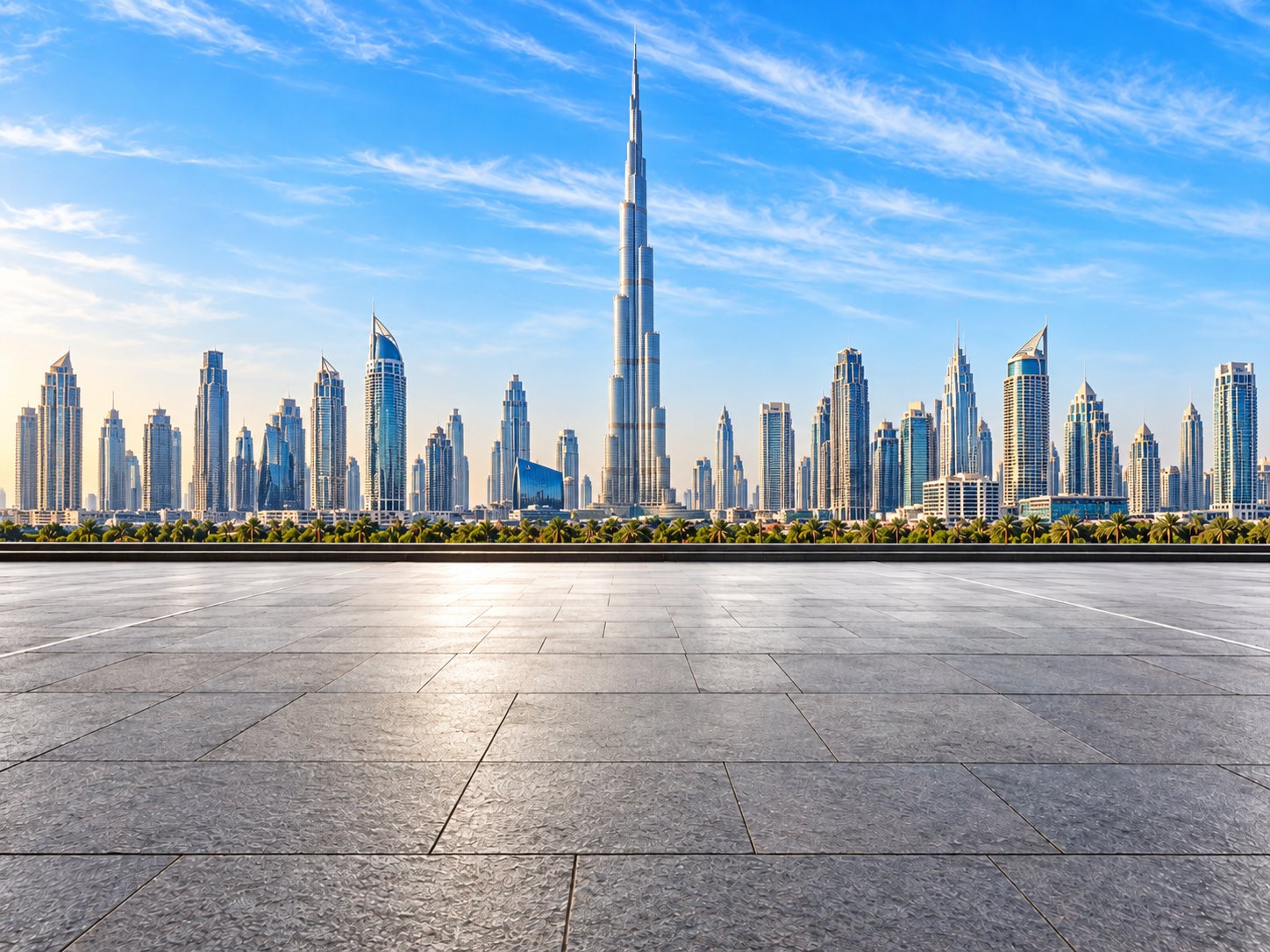 The Downtown Dubai skyline, with the Burj Khalifa rising above Business Bay beyond an open plaza